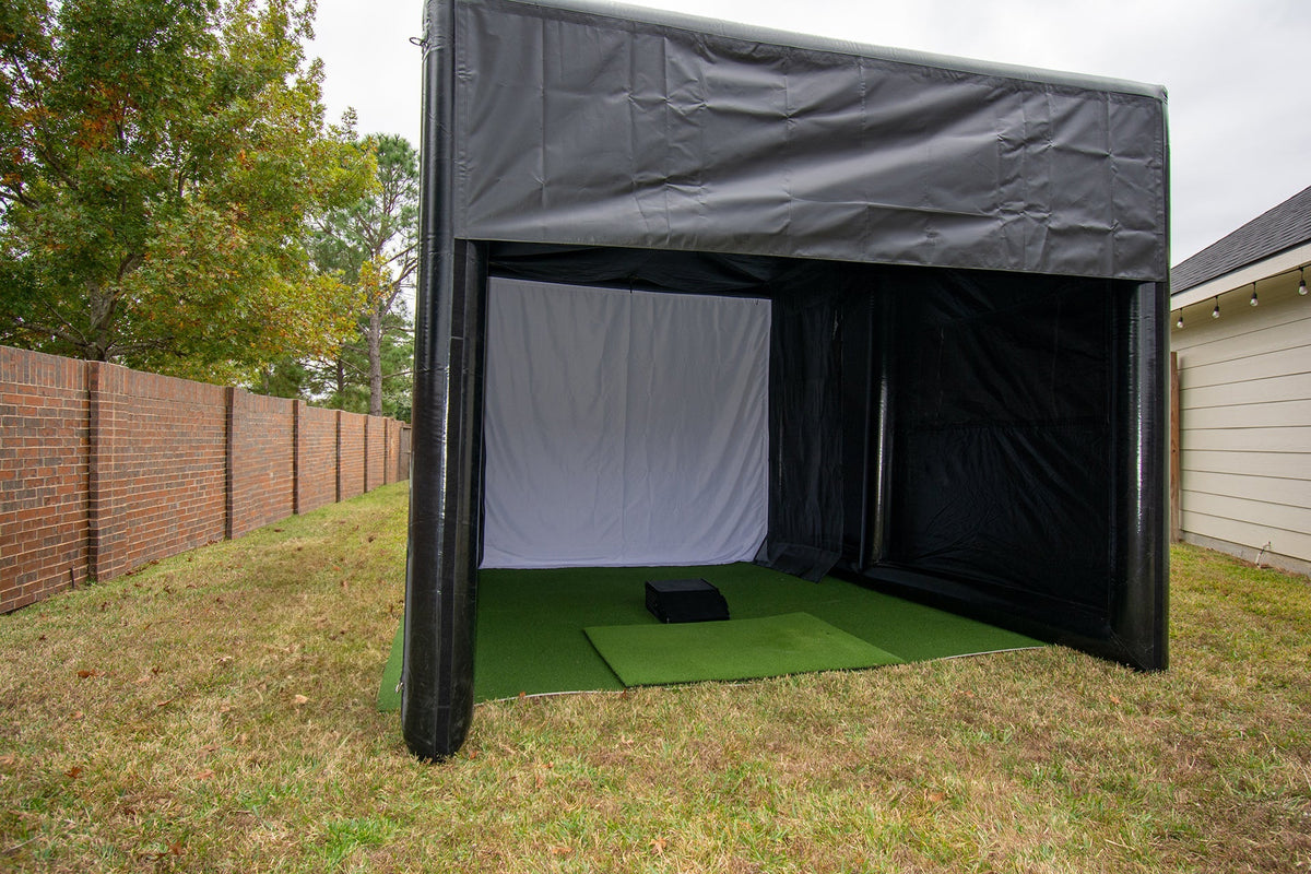 12x16 inflatable golf simulator enclosure set up with impact screen