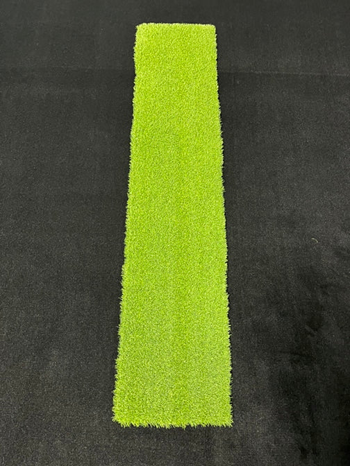 Big Moss Pure Flight Premium Hitting Strip size and scale in a golf simulator room