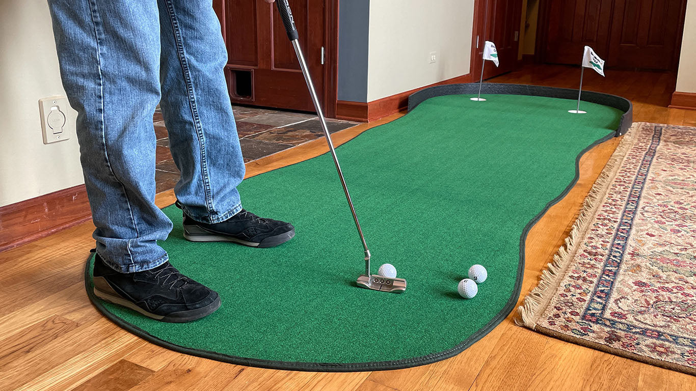 Big Moss Augusta V2 putting green shown with chipping mat and break pads.