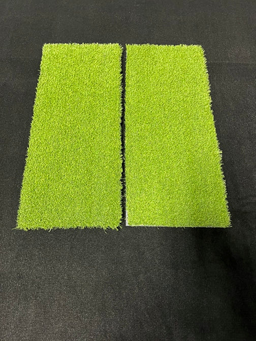Golfer taking a descending strike on the Big Moss Pure Flight Premium Hitting Strip