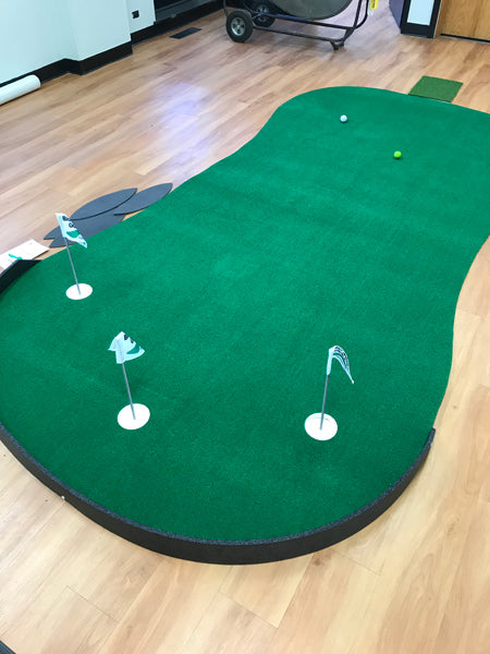Big Moss Admiral putting green in an indoor practice room