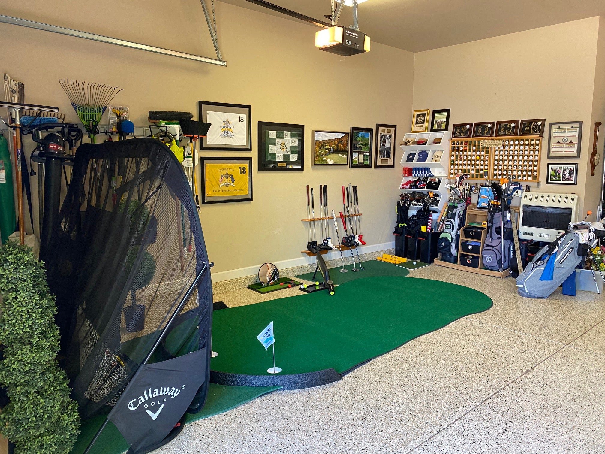 Big Moss General V2 putting green setup with stadium backstop and chipping mat.