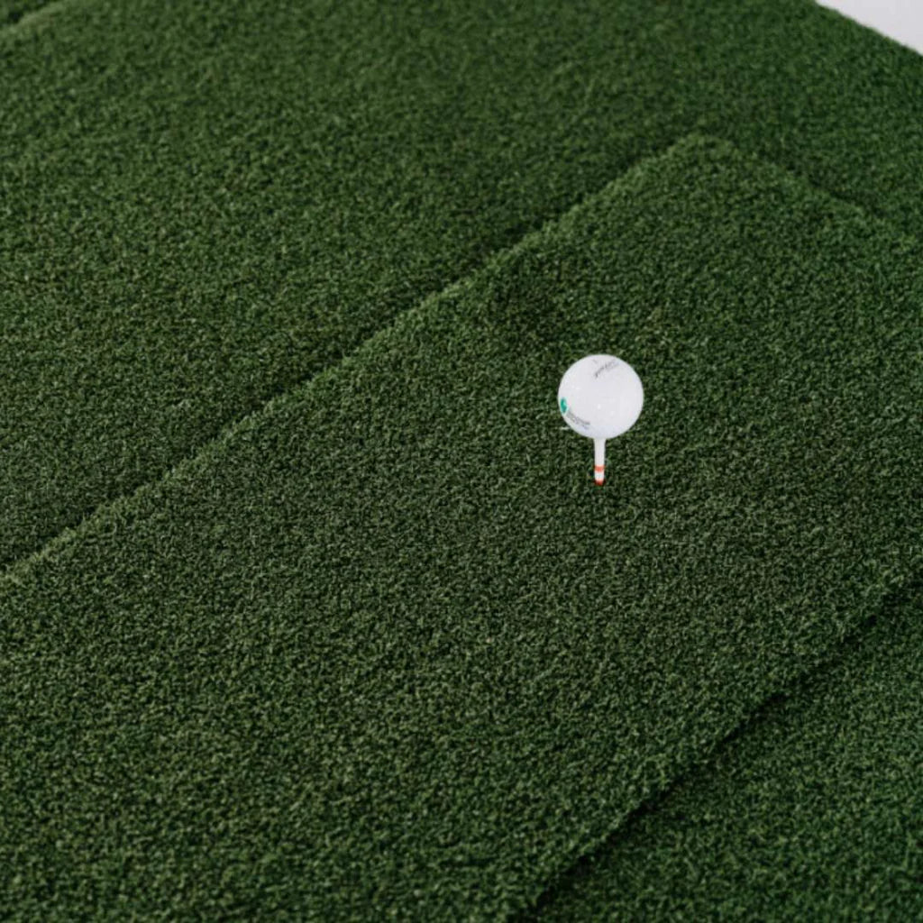 SIGPRO Softy Hitting Strip with a real golf tee inserted